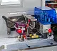 Автоматическая горизонтальная упаковочная машина DXDZ-350XD под ВПП (3 servo, лент.150 мм, рег.форм., min bag L 120, H 50, трансп.попереч.запайки) Hualian - Купить с доставкой по всей России - 2