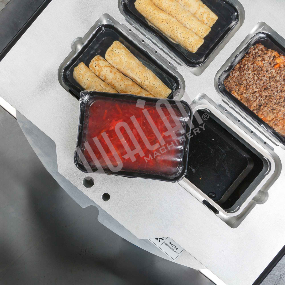 Полуавтоматический запайщик лотков ротационного типа (4 лотка,187*137*120) HVT-450R (нерж.) Hualian - Купить с доставкой по всей России - 25