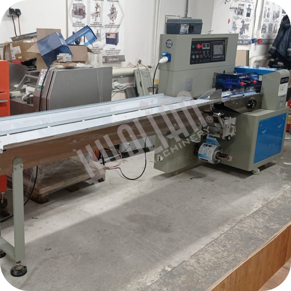 Горизонтальная упаковочная машина DXDZ-250XD NEW (W 80, S 280, рег. форм., L 120-280, H 40) (Выставочный образец) Hualian - Купить с доставкой по всей России - 3