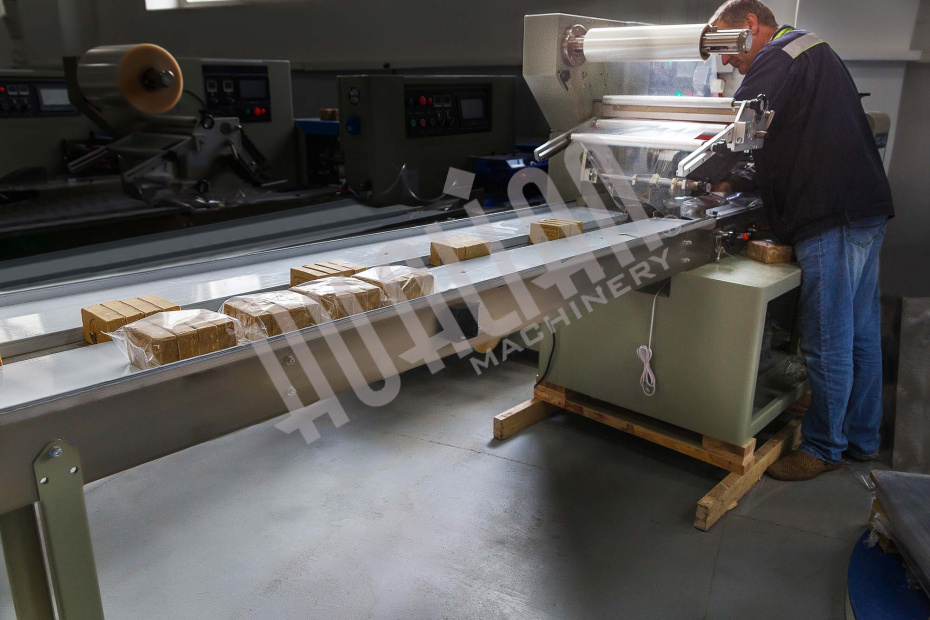 Горизонтальная упаковочная машина DXDZ-450B NEW (H-70 mm, bag L 130-450mm, S 400mm, рег. формир-ль 180 мм, транспортер попер. запайки) Hualian - Купить с доставкой по всей России - 15