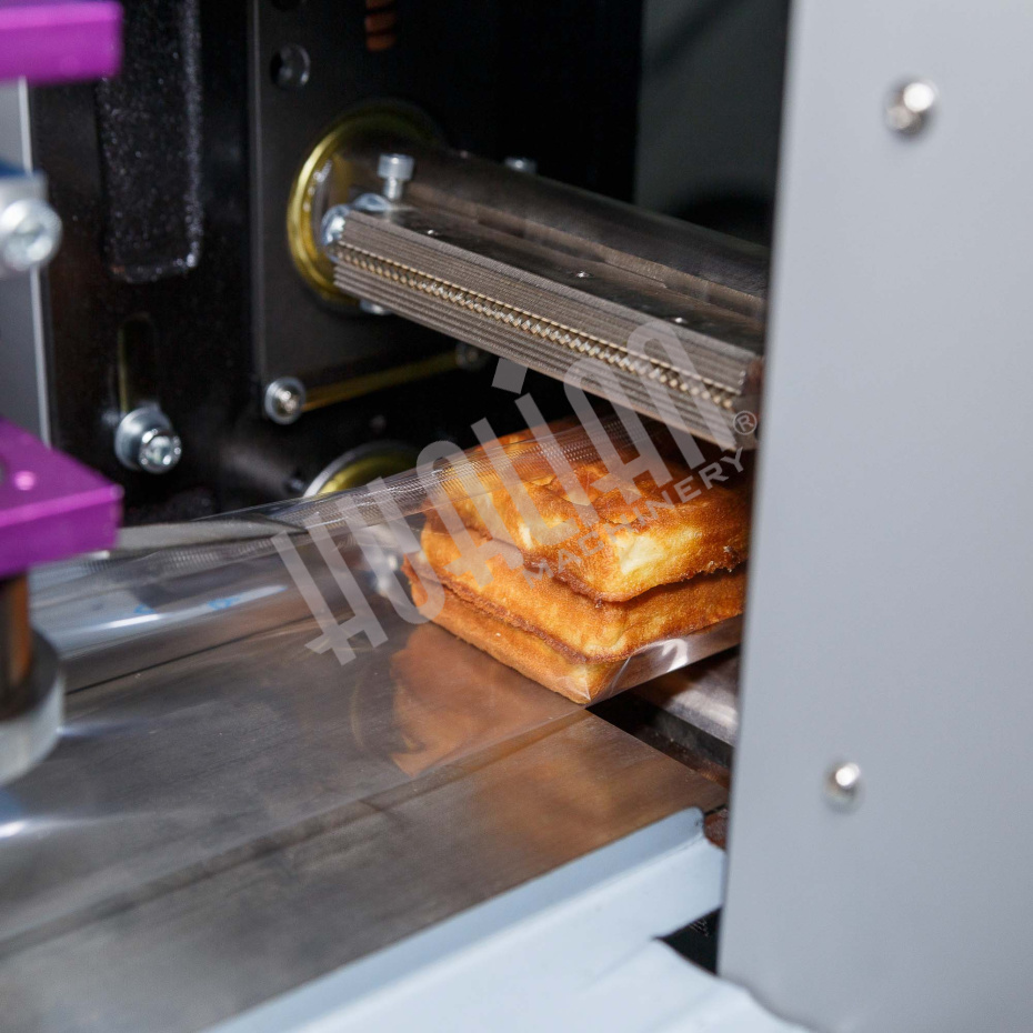 Горизонтальная упаковочная машина DXDZ-250XD (лент. 60 мм, рег. форм., S 250, L 120-280, H 60) Hualian - Купить с доставкой по всей России - 20