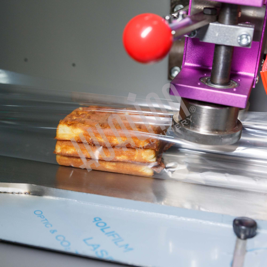 Горизонтальная упаковочная машина DXDZ-250XD (лент.100 мм, рег. форм., S 250, L 120-280, H 60) Hualian - Купить с доставкой по всей России - 9