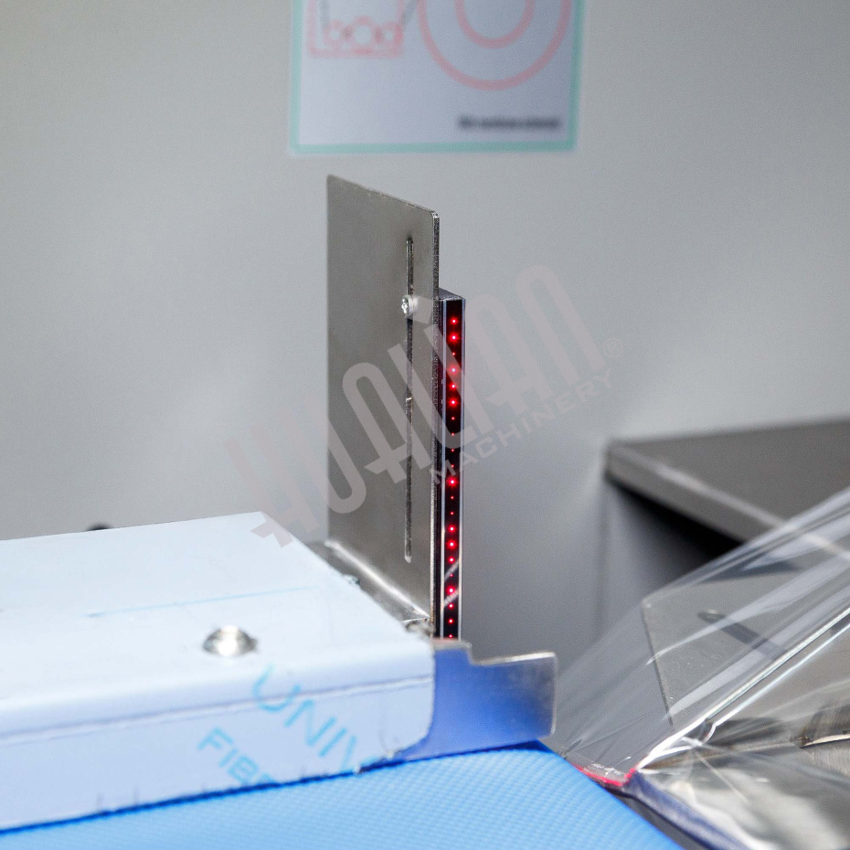 Горизонтальная упаковочная машина DXDZ-600XD (лент. 250 мм, рег.форм., S 400, L 180-500, H-120) Hualian - Купить с доставкой по всей России - 22