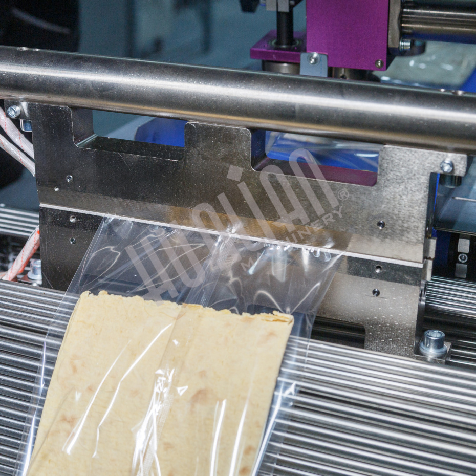 Горизонтальная упаковочная машина DXDZ-600XD (3 серв., H-110 мм, L не огр., W 145-285 мм, HL-1108, круг. отв., подбой, прок. пакета) Hualian - Купить с доставкой по всей России - 27