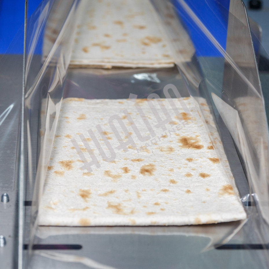 Горизонтальная упаковочная машина DXDZ-600XD (3 серв., H-110 мм, L не огр., W 145-285 мм, HL-1108, круг. отв., подбой, прок. пакета) Hualian - Купить с доставкой по всей России - 22