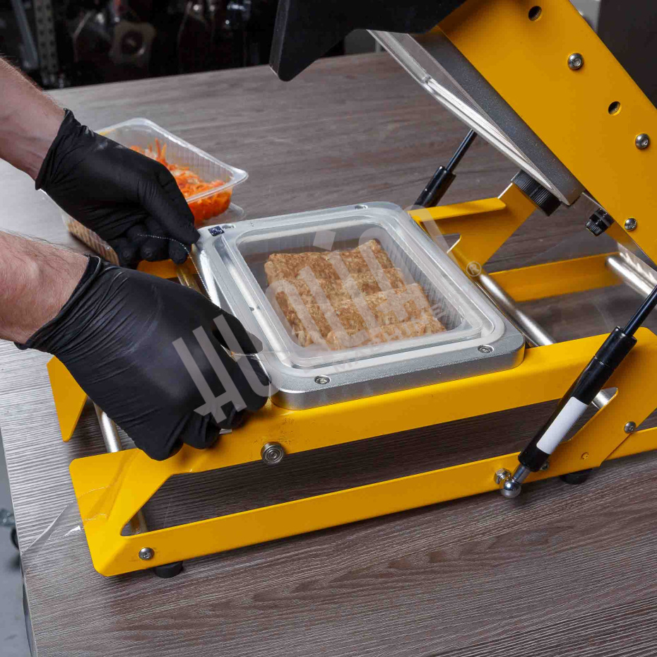 Ручной запайщик лотков HTS-210R Крашеный корпус (210*148) Hualian - Купить с доставкой по всей России - 16