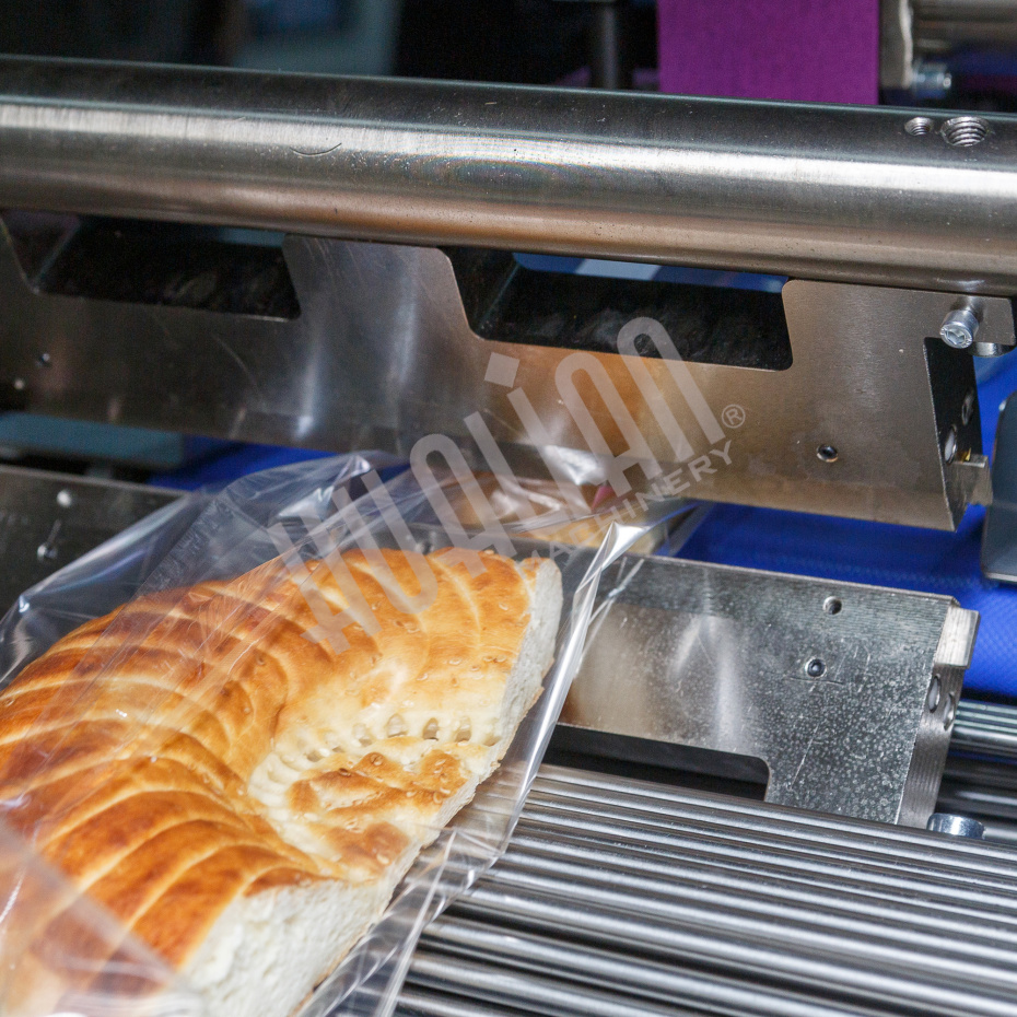 Горизонтальная упаковочная машина DXDZ-600XD (3 серв., H-110 мм, L не огр., W 145-285 мм, HL-1108, круг. отв., подбой, прок. пакета) Hualian - Купить с доставкой по всей России - 32