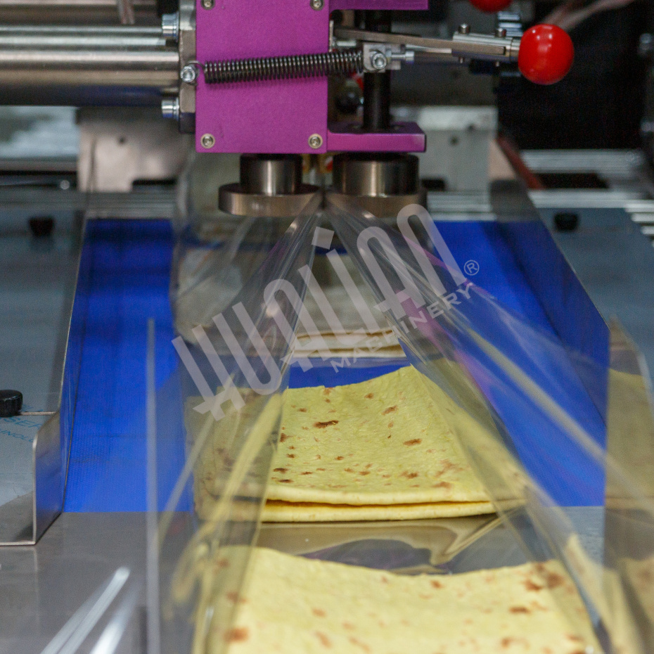 Горизонтальная упаковочная машина DXDZ-600XD (3 серв., H-110 мм, L не огр., W 145-285 мм, HL-1108, круг. отв., подбой, прок. пакета) Hualian - Купить с доставкой по всей России - 18