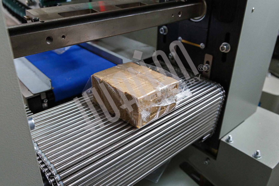 Горизонтальная упаковочная машина DXDZ-450B NEW (H-70 mm, bag L 130-450mm, S 400mm, рег. формир-ль 180 мм, транспортер попер. запайки) Hualian - Купить с доставкой по всей России - 14