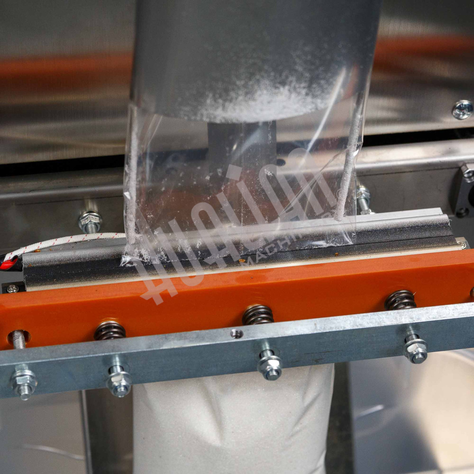 Автоматическая фасовочно-упаковочная машина DXDK-1000 NEW (пакет подушка, ширина пленки 300 мм, фотодатчик) Hualian - Купить с доставкой по всей России - 9