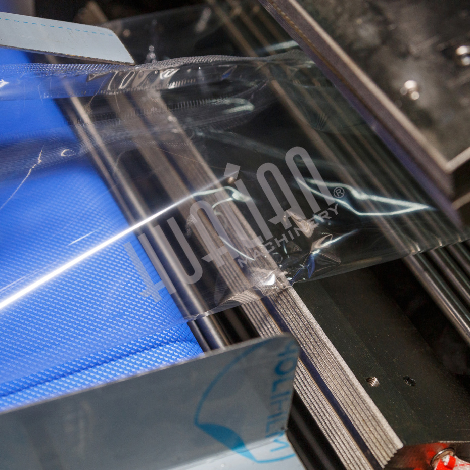 Горизонтальная упаковочная машина DXDZ-600XD (3 серв., H-110 мм, L не огр., W 145-285 мм, HL-1108, круг. отв., подбой, прок. пакета) Hualian - Купить с доставкой по всей России - 11