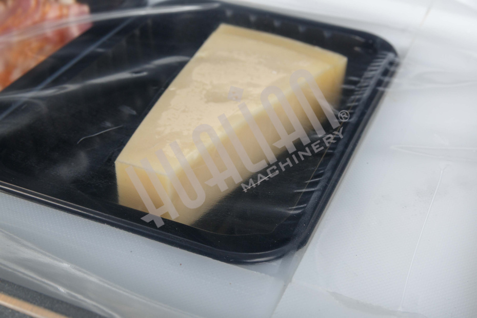 Скин-упаковочная машина HLV-300VST NEW на два лотка (глубина лотка 55 мм) Hualian - Купить с доставкой по всей России - 26