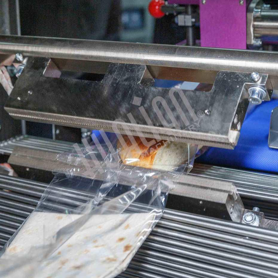 Горизонтальная упаковочная машина DXDZ-600XD (3 servo, лент. 280 мм, рег. форм., min bag L 130, H max. 65, трансп.попереч.запайки) Hualian - Купить с доставкой по всей России - 6