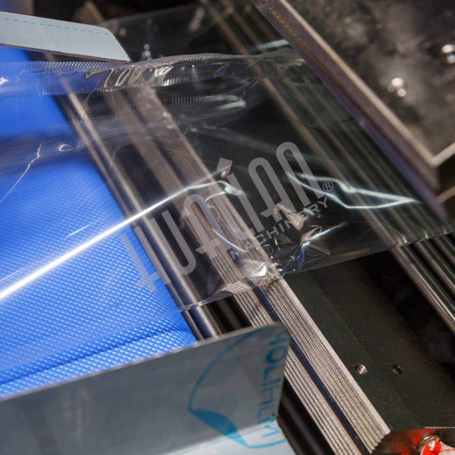 Горизонтальная упаковочная машина DXDZ-600XD (3 servo, лент. 280 мм, рег. форм., min bag L 130, H max. 65, трансп.попереч.запайки) Hualian - Купить с доставкой по всей России - 14