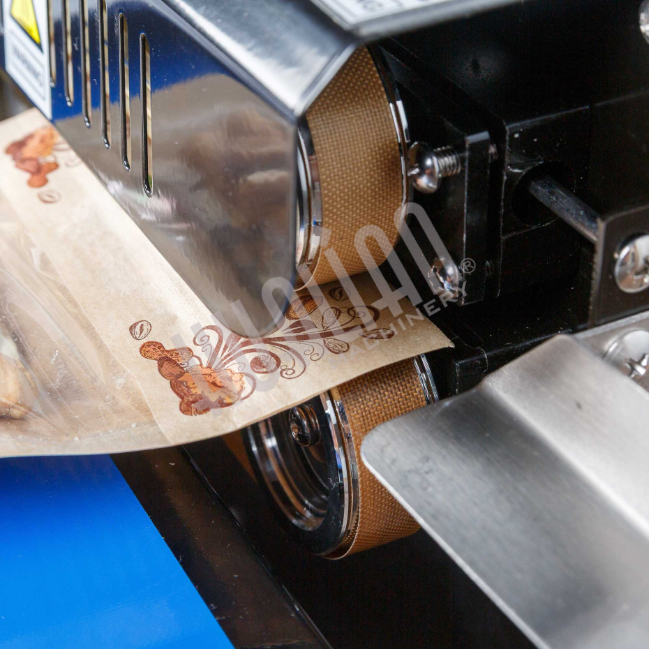 Роликовый (конвейерный) запайщик с правой подачей FRD-750E (горизонт.) Hualian - Купить с доставкой по всей России - 8