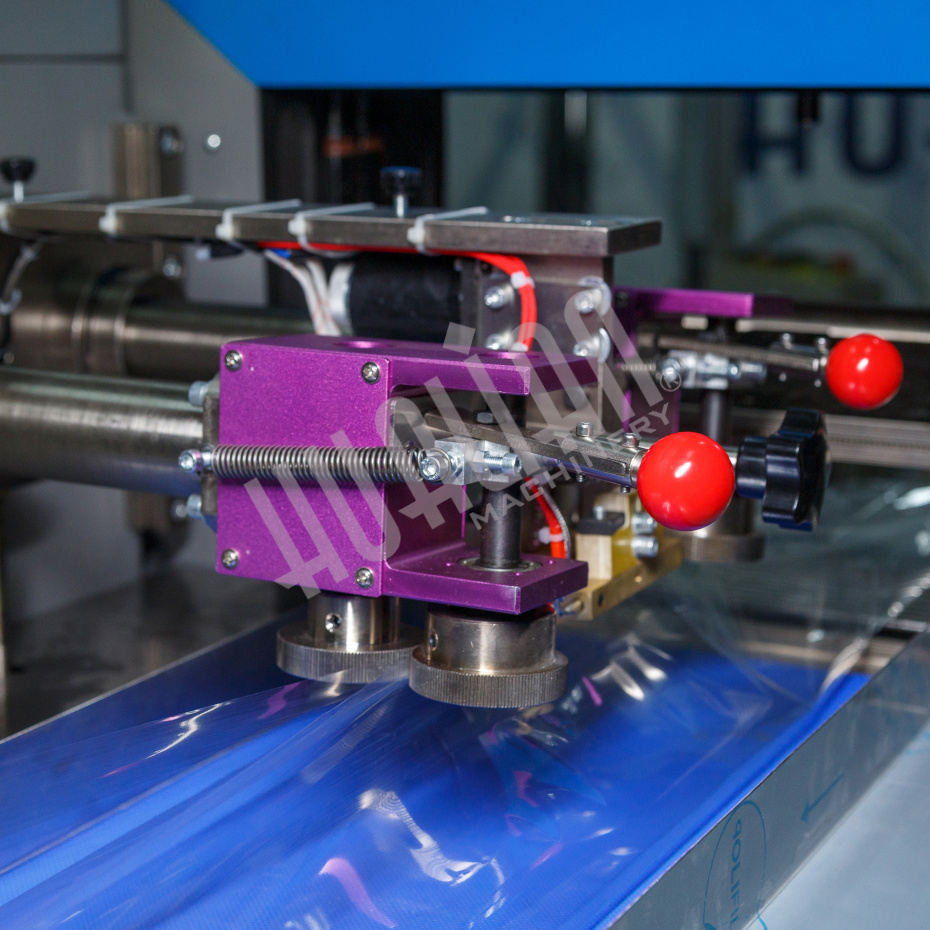 Горизонтальная упаковочная машина DXDZ-600XD (3 серв., H-110 мм, L не огр., W 145-285 мм, HL-1108, круг. отв., подбой, прок. пакета) Hualian - Купить с доставкой по всей России - 10