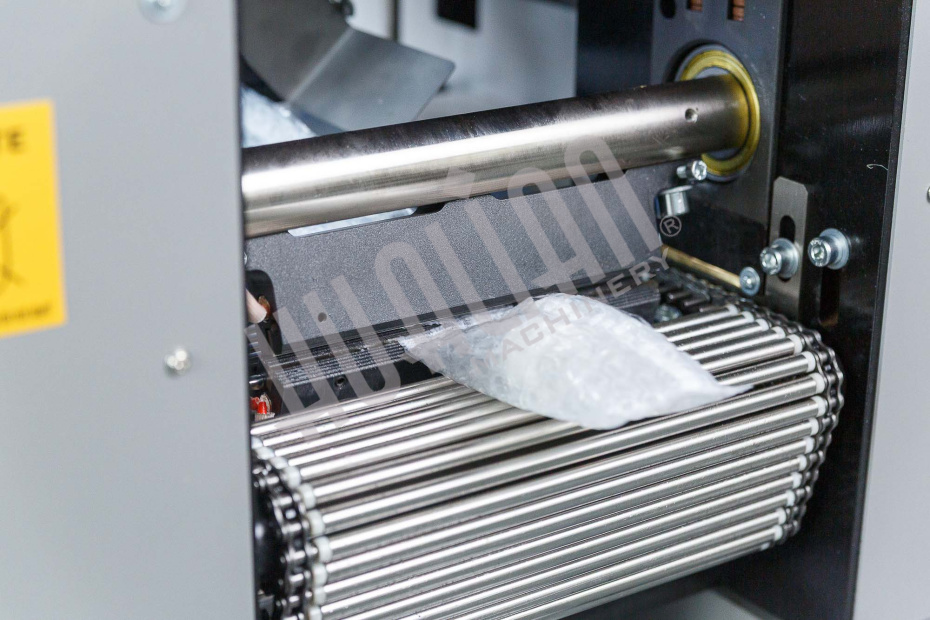 Автоматическая горизонтальная упаковочная машина DXDZ-350XD под ВПП (3 servo, лент.150 мм, рег.форм., min bag L 120, H 50, трансп.попереч.запайки) Hualian - Купить с доставкой по всей России - 10