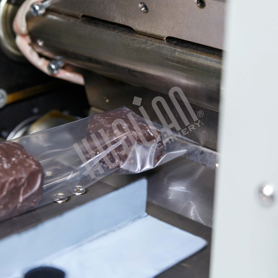 Автоматическая горизонтальная упаковочная машина DXDZ-250B (3 servo, рег. форм., min bag L 65, S 200, H 40, 2-х позиц. нож) Hualian - Купить с доставкой по всей России - 13