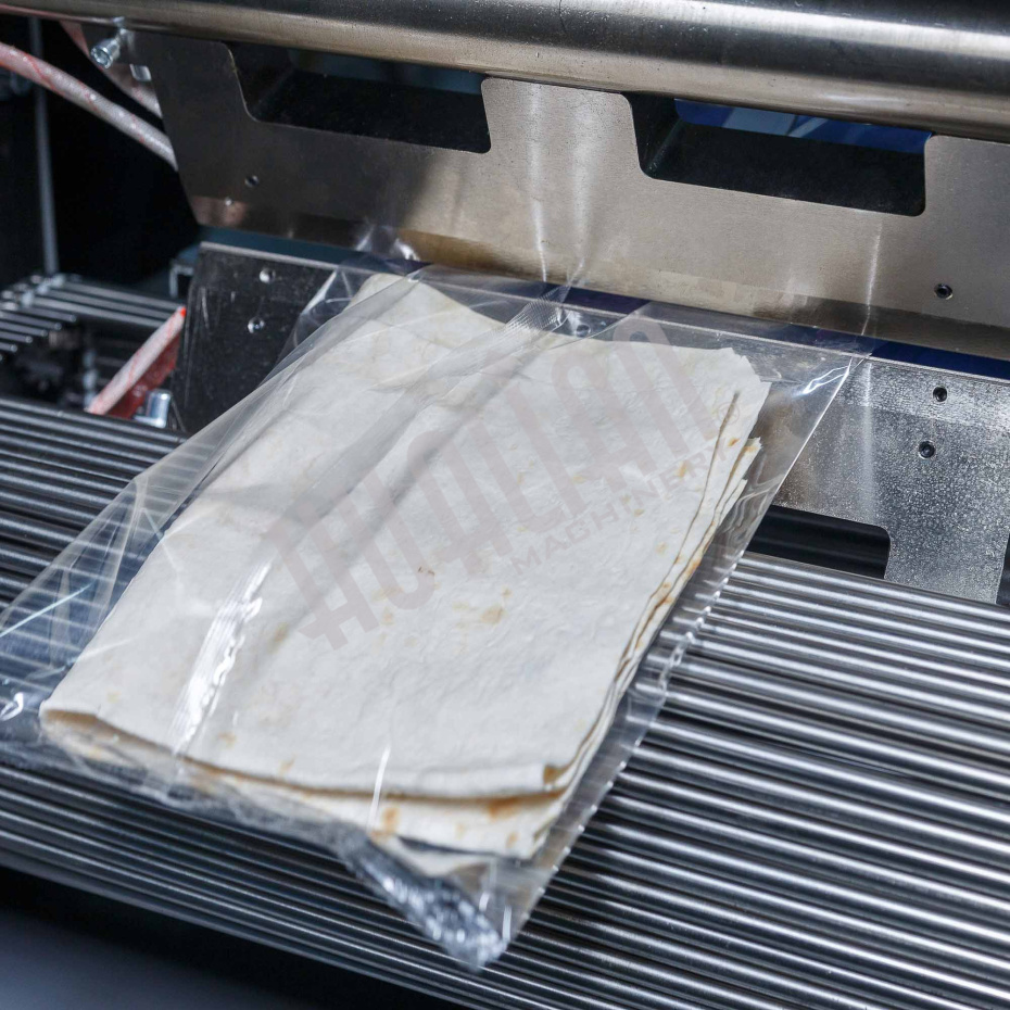 Горизонтальная упаковочная машина DXDZ-600XD (3 servo, лент. 250 мм, рег. форм., min bag L 180, H 120, трансп.попереч.запайки) Hualian - Купить с доставкой по всей России - 5