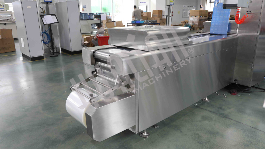 Термоформовочная машина HVR-420A (220*76.8*50 мм; 300*76.8*50 мм; вод.охл., газ., этикетировщик) Hualian - Купить с доставкой по всей России - 7