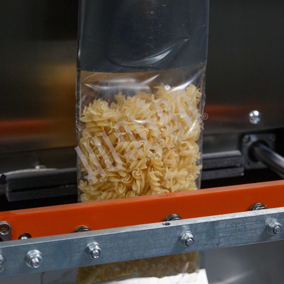 Автоматическая фасовочно-упаковочная машина DXDK-1000 NEW (пакет подушка, ширина пленки 300 мм, фотодатчик) Hualian - Купить с доставкой по всей России - 12