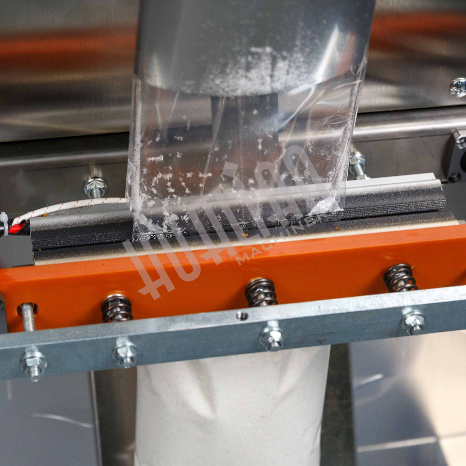 Автоматическая фасовочно-упаковочная машина DXDK-1000 NEW (пакет подушка, ширина пленки 300 мм, фотодатчик) Hualian - Купить с доставкой по всей России - 7