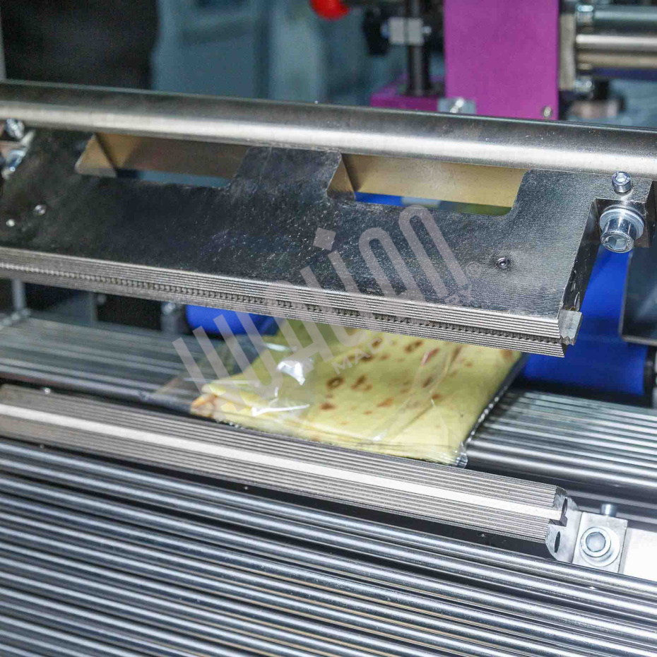 Горизонтальная упаковочная машина DXDZ-600XD (3 servo, лент. 280 мм, рег. форм., min bag L 130, H max. 65, трансп.попереч.запайки) Hualian - Купить с доставкой по всей России - 19