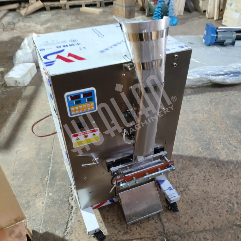 Автоматическая фасовочно-упаковочная машина DXDK-1000 NEW (Выставочный образец) (пакет-подушка,W пленки 300 м Hualian - Купить с доставкой по всей России - 9