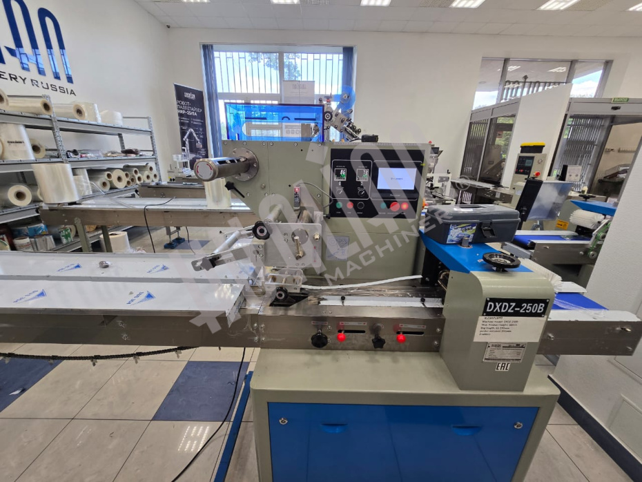 Горизонтальная упаковочная машина DXDZ-250B NEW (2 ножа, bag L 65-190 mm, S 200 mm, H-40 mm) (Выставочный образец) Hualian - Купить с доставкой по всей России - 5