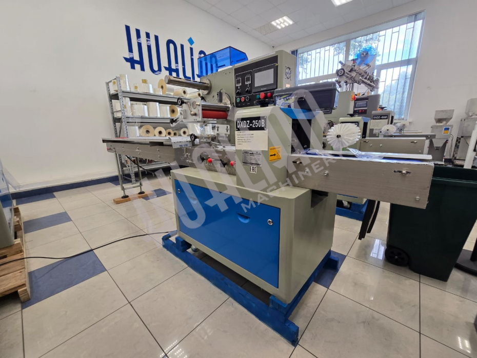 Горизонтальная упаковочная машина DXDZ-250B NEW (2 ножа, bag L 65-190 mm, S 200 mm, H-40 mm) (Выставочный образец) Hualian - Купить с доставкой по всей России - 8