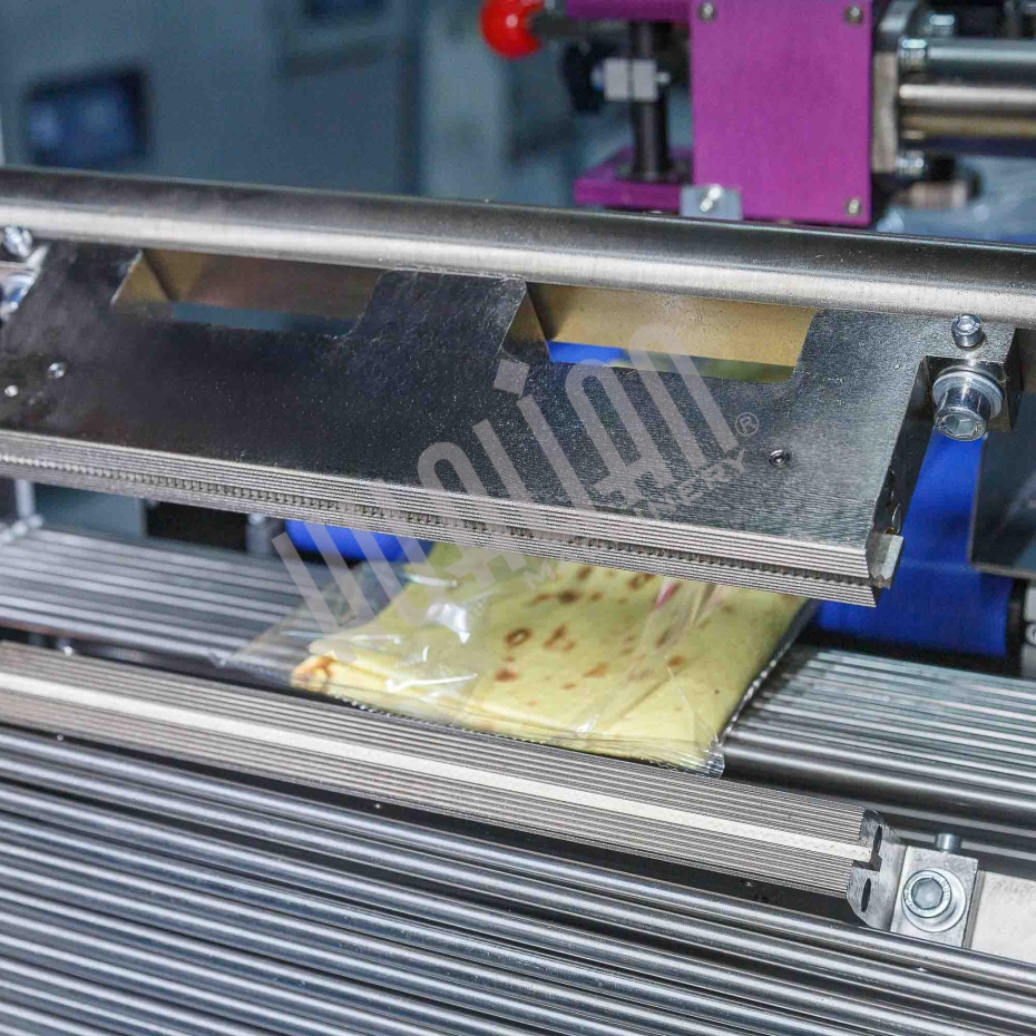 Горизонтальная упаковочная машина DXDZ-600XD (лент. 250 мм, рег.форм., S 400, L 180-500, H-120) Hualian - Купить с доставкой по всей России - 37