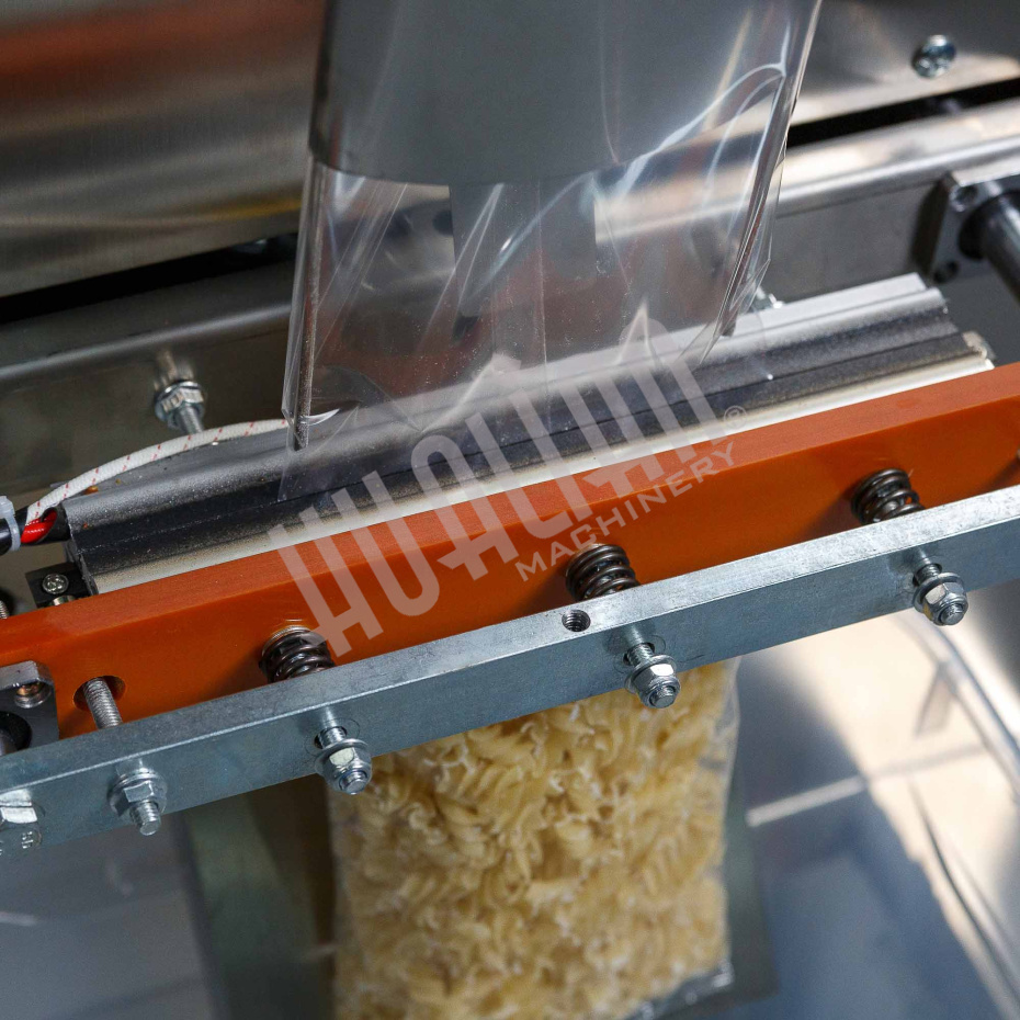 Автоматическая фасовочно-упаковочная машина DXDK-1000 NEW (пакет подушка, ширина пленки 300 мм, фотодатчик) Hualian - Купить с доставкой по всей России - 14