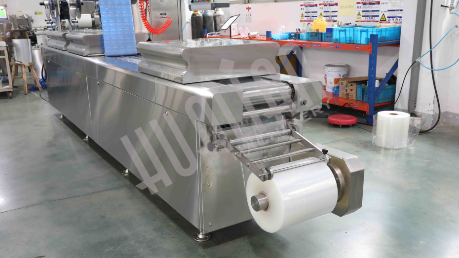 Термоформовочная машина HVR-420A (220*76.8*50 мм; 300*76.8*50 мм; вод.охл., газ., этикетировщик) Hualian - Купить с доставкой по всей России - 8