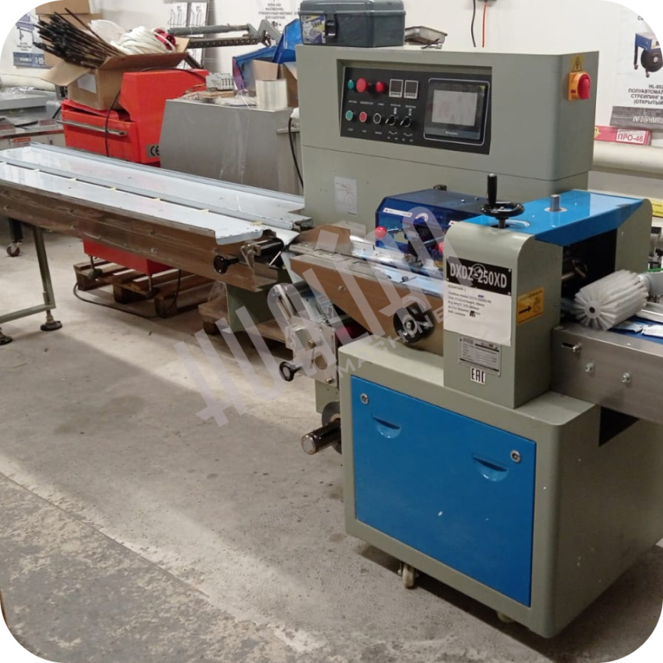 Горизонтальная упаковочная машина DXDZ-250XD NEW (W 80, S 280, рег. форм., L 120-280, H 40) (Выставочный образец) Hualian - Купить с доставкой по всей России - 2