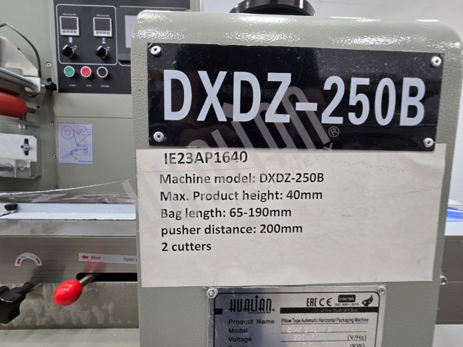 Горизонтальная упаковочная машина DXDZ-250B NEW (2 ножа, bag L 65-190 mm, S 200 mm, H-40 mm) (Выставочный образец) Hualian - Купить с доставкой по всей России - 6