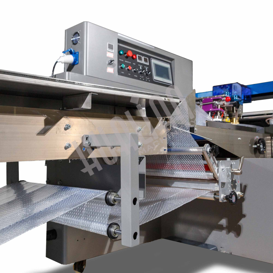 Автоматическая горизонтальная упаковочная машина DXDZ-600XD под ВПП (3 servo, лент. 250 мм, рег. форм., min bag L 130, H 120, трансп.попереч.запайки) Hualian - Купить с доставкой по всей России - 4