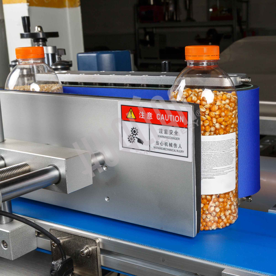 Автоматический этикетировщик для круглой тары с датером HLKP-35D Hualian - Купить с доставкой по всей России - 9