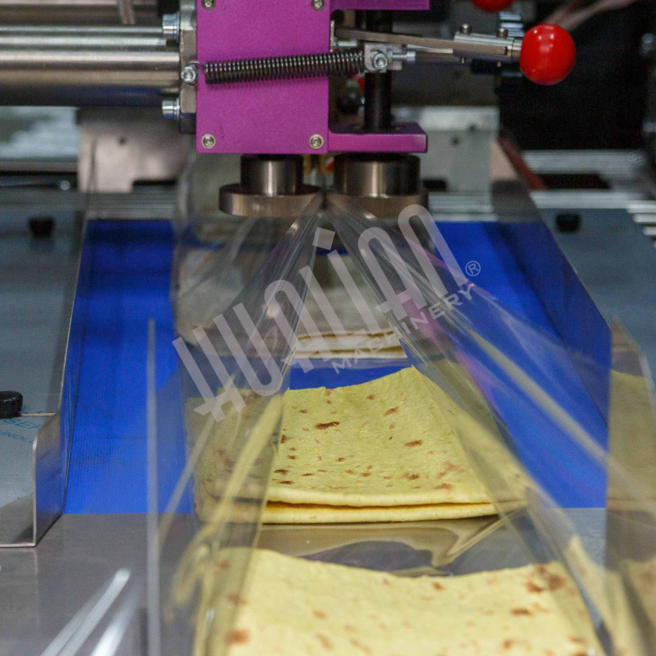 Горизонтальная упаковочная машина DXDZ-600XD (3 servo, лент. 250 мм, рег. форм., min bag L 180, H 120, трансп.попереч.запайки) Hualian - Купить с доставкой по всей России - 10