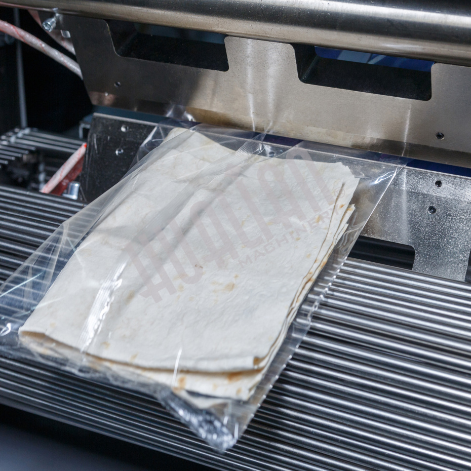 Горизонтальная упаковочная машина DXDZ-600XD (3 серв., H-110 мм, L не огр., W 145-285 мм, HL-1108, круг. отв., подбой, прок. пакета) Hualian - Купить с доставкой по всей России - 7