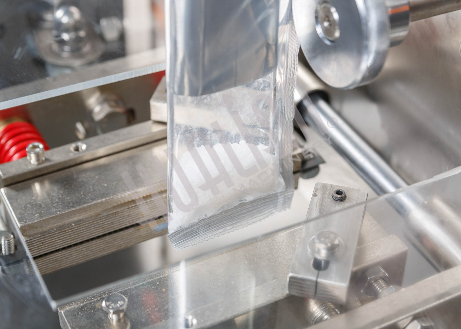 Автоматическая фасовочно-упаковочная машина DXDK-320RH-E (нерж., стик 17*110 мм, 4.6-8 мл, W пленки 42 мм, зубч. нож.) Hualian - Купить с доставкой по всей России - 15