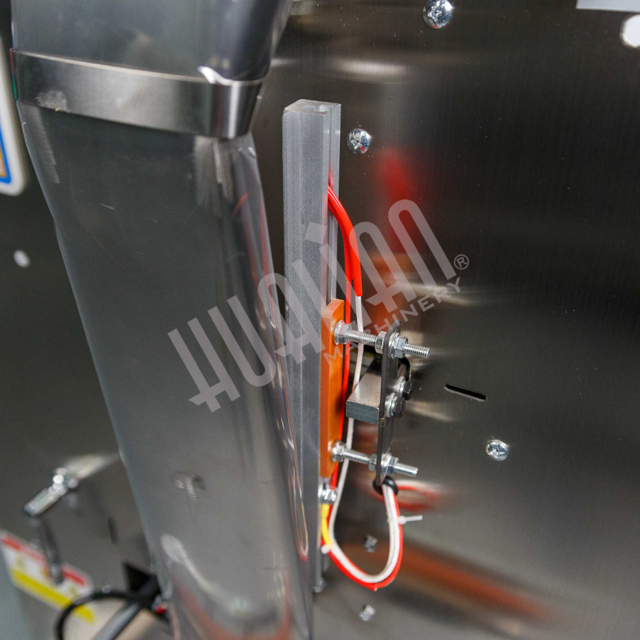 Автоматическая фасовочно-упаковочная машина DXDK-1000 NEW (пакет подушка, ширина пленки 300 мм, фотодатчик) Hualian - Купить с доставкой по всей России - 19