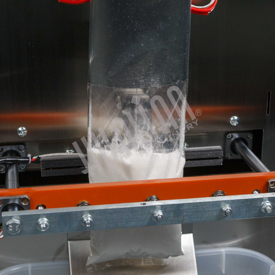 Автоматическая фасовочно-упаковочная машина DXDK-1000 NEW (пакет подушка, ширина пленки 300 мм, фотодатчик) Hualian - Купить с доставкой по всей России - 2