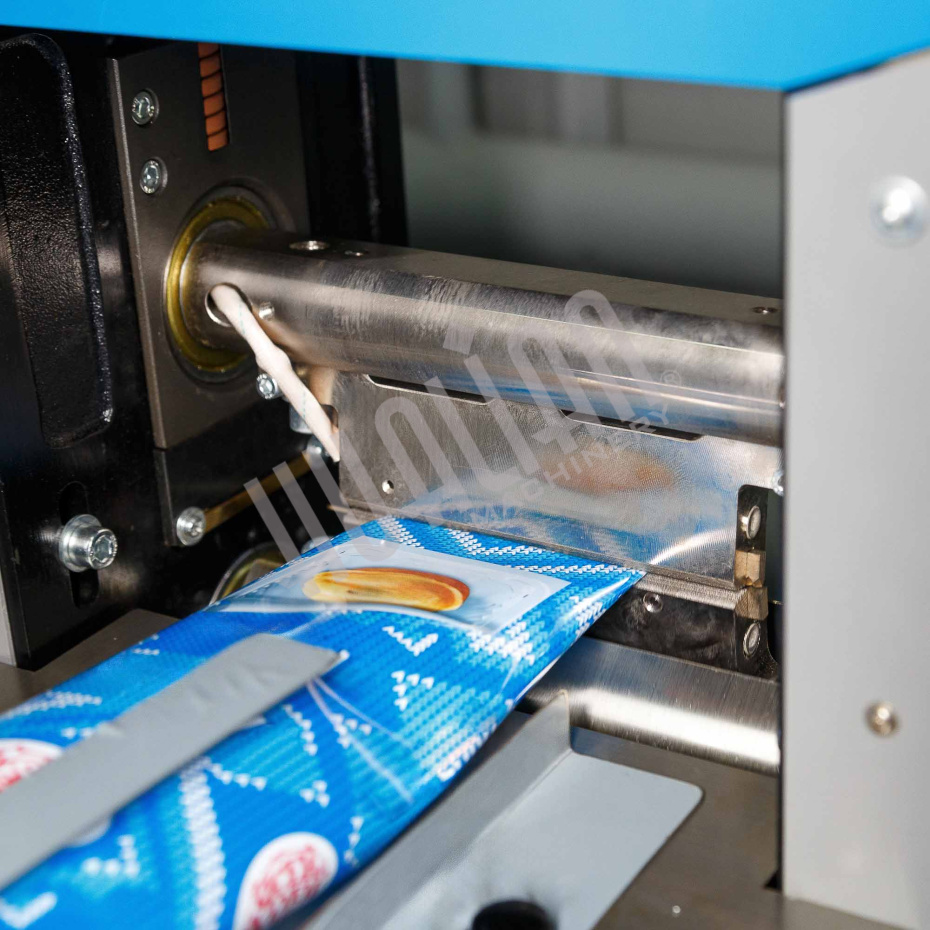 Автоматическая горизонтальная упаковочная машина DXDZ-250D NEW (1 нож, bag L 120-280mm, S 250mm, H - 40 mm) Hualian - Купить с доставкой по всей России - 8