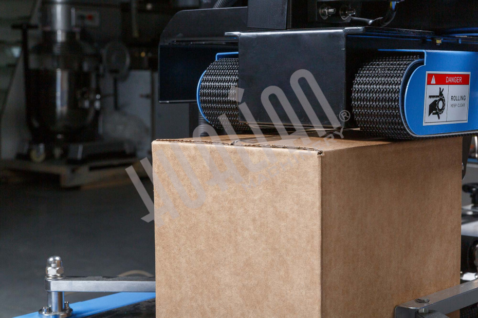 Полуавтоматический заклейщик коробов FXJ-6050С Hualian - Купить с доставкой по всей России - 7