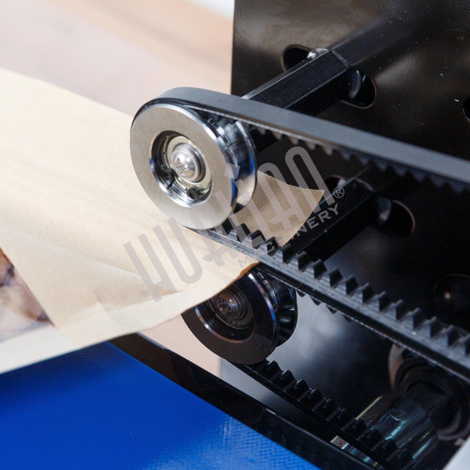 Роликовый (конвейерный) запайщик с правой подачей FRD-750E (горизонт.) Hualian - Купить с доставкой по всей России - 13