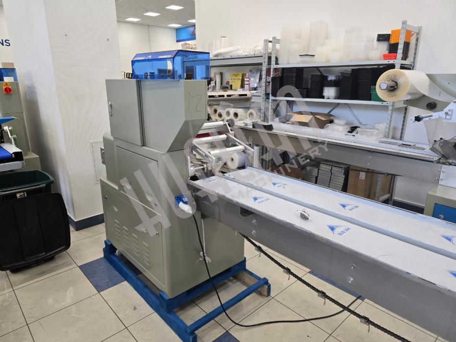 Горизонтальная упаковочная машина DXDZ-250B NEW (2 ножа, bag L 65-190 mm, S 200 mm, H-40 mm) (Выставочный образец) Hualian - Купить с доставкой по всей России - 7