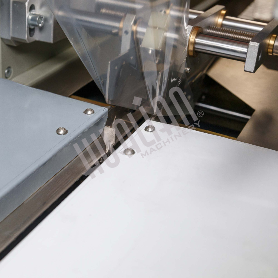 Автоматическая горизонтальная упаковочная машина DXDZ-250B (3 servo, рег. форм., min bag L 65, S 200, H 40, 2-х позиц. нож) Hualian - Купить с доставкой по всей России - 8